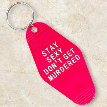 STAY SEXY DON’T GET MURDERED KEYCHAIN